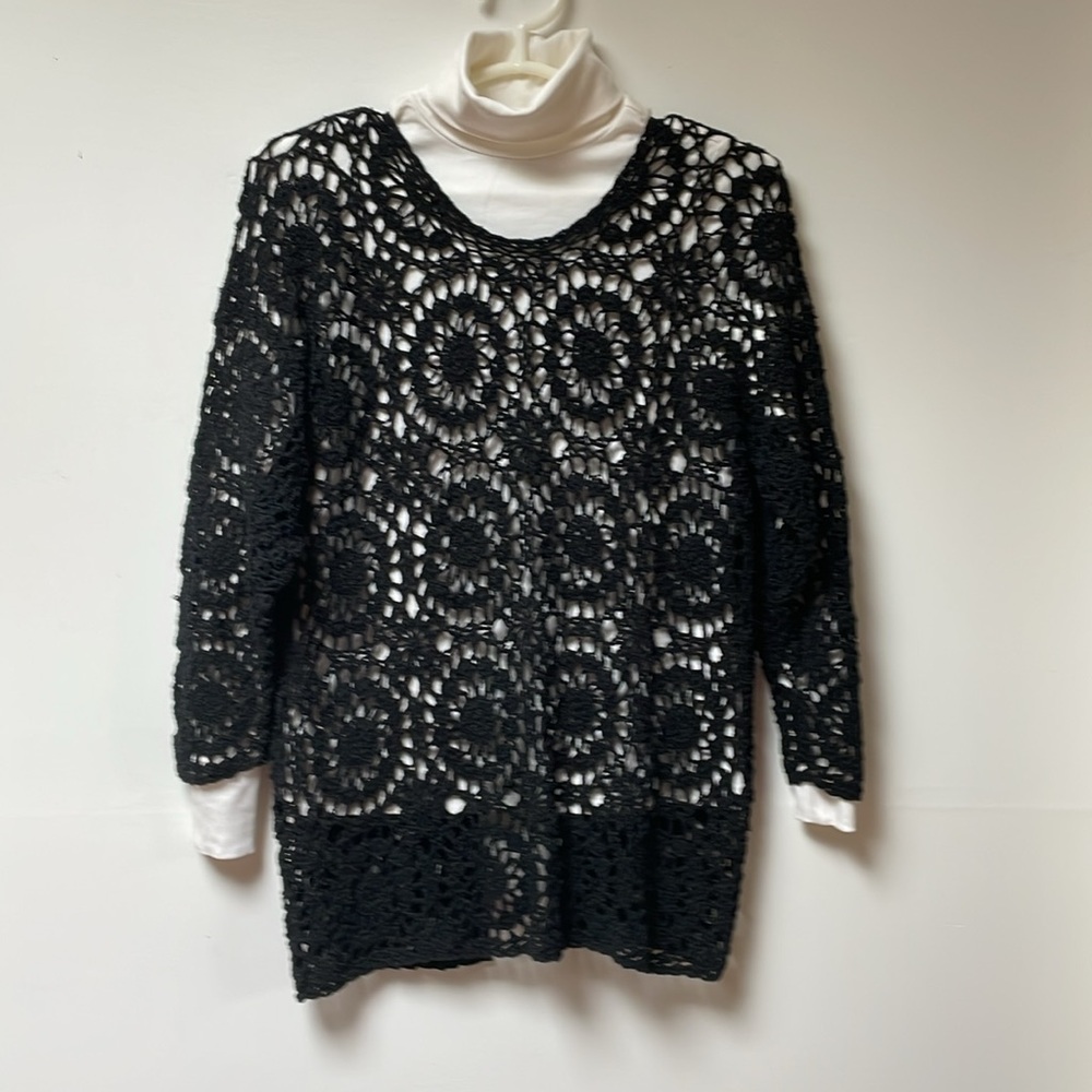 Up cycled crocheted sweater with back bow tie